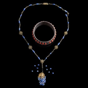 A Chinese coral-inlaid silver bangle and a lapis necklace, Republic period