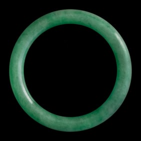 A Chinese jadeite bangle, 19th century