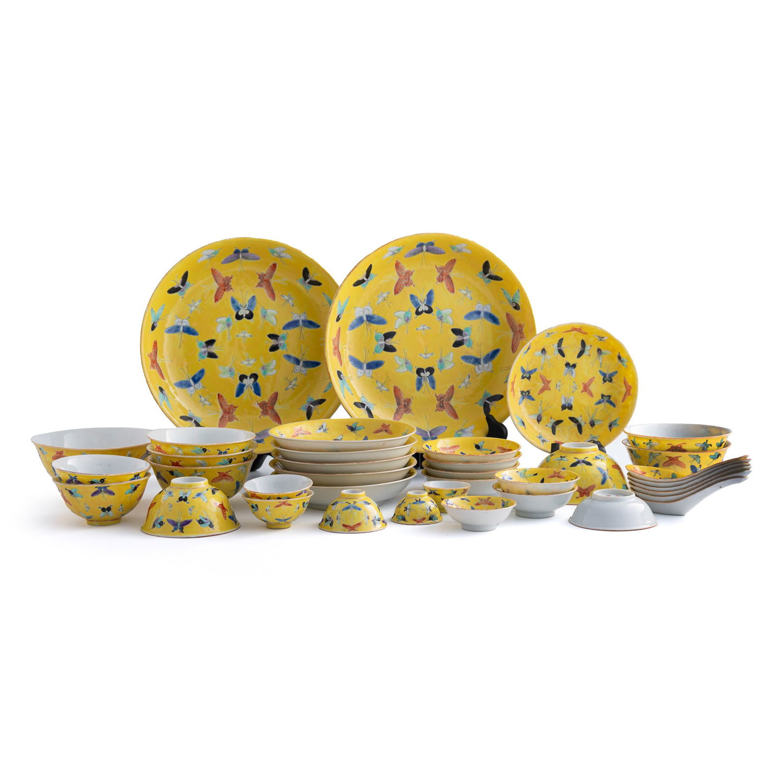 A Chinese 37-piece yellow-ground famille rose 'hundred butterflies' dinner set, Republic period (1 of 15)