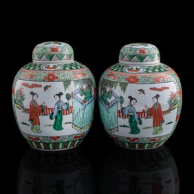 A pair of Chinese wucai 'figural' covered jars, late 19th century