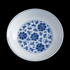 A Chinese blue and white 'lotus scroll' dish, Qianlong period, Qing dynasty