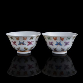 A pair of Chinese famille rose 'hundred butterflies' cups, Guangxu period, Qing dynasty