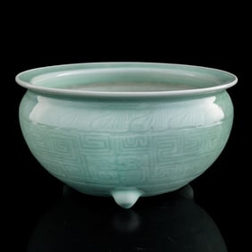 A Chinese celadon tripod censer, early 19th century