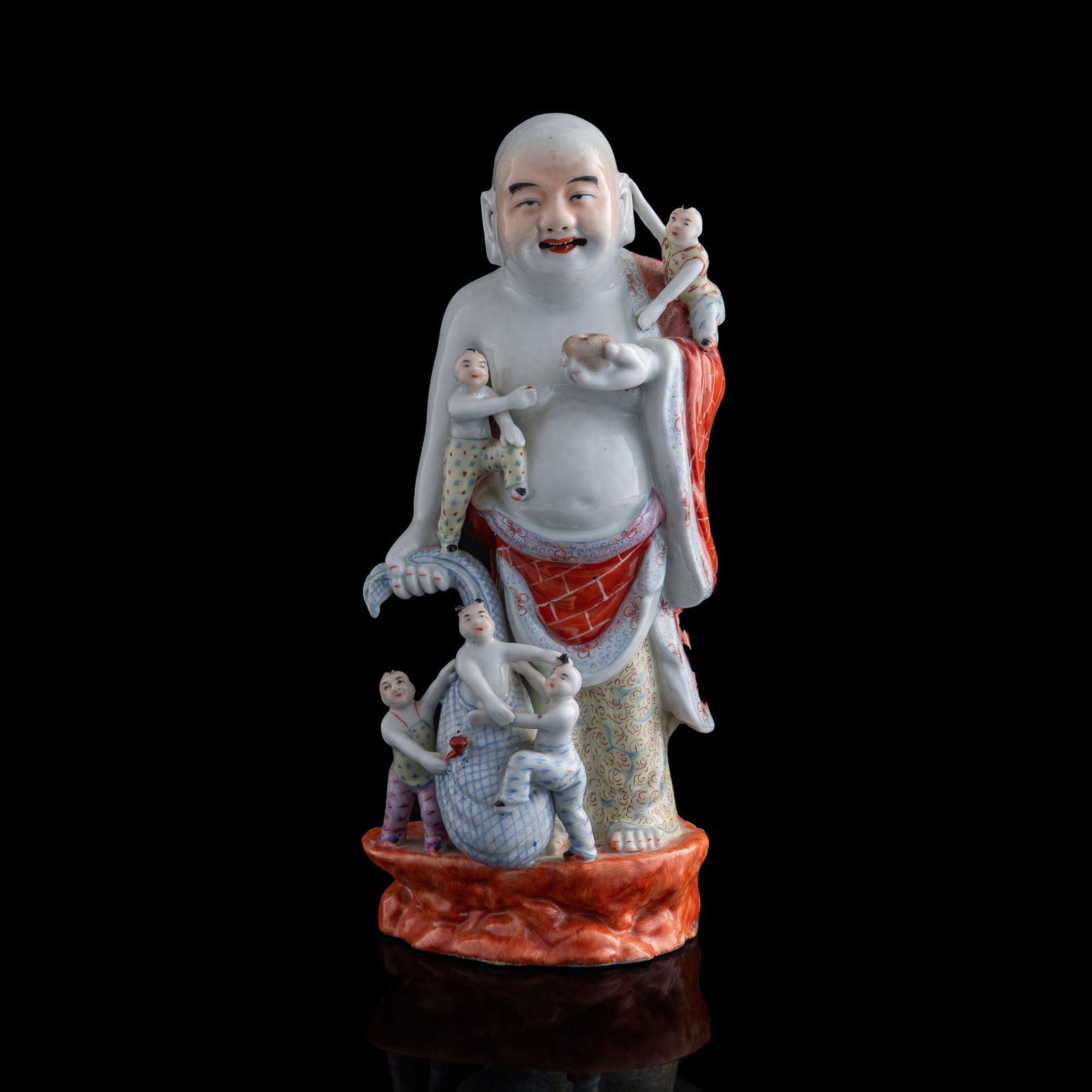 A Chinese famille rose Buddha, Republic period: A Chinese famille rose Buddha Republic period H: 11, W: 4 5/8, D: 4 1/8 in. (H: 27.94, W: 11.75, D: 10.48 cm.) Private collection, New Jersey. Click h