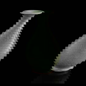 A Chinese Longquan celadon 'yuhuchun' vase, Ming dynasty: A Chinese Longquan celadon 'yuhuchun' vase Ming dynasty H: 8 5/8, Dia: 4 7/8 in. (H: 21.91, Dia: 12.38 cm.) Private collection, San Diego, California.