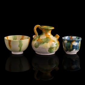 A Chinese sancai ewer and two cups, Tang dynasty