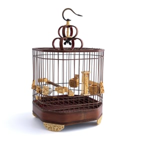 A well-carved Chinese bamboo bird cage, 19th century