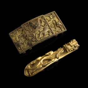 A Chinese gilt-bronze belt buckle and a dragon hook, 19th century
