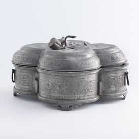A Chinese tin five-lidded compartment box, late 19th century