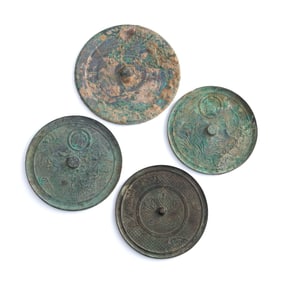 Four Chinese bronze mirrors, Tang dynasty or later