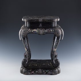 A Chinese black lacquer with mother-of-pearl inlay stool, 18th century or earlier