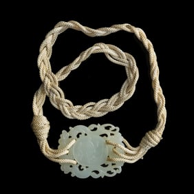 A Chinese white jade 'dragon and phoenix' plaque, 19th century