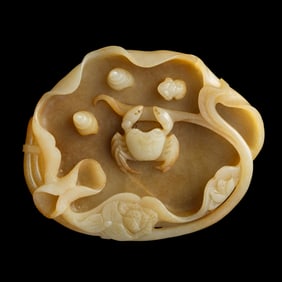 A Chinese carved jade lotus leaf-form washer, early 19th century