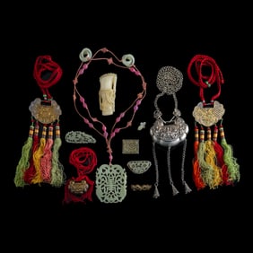 A group of Chinese silver locks and ornaments, 19th century