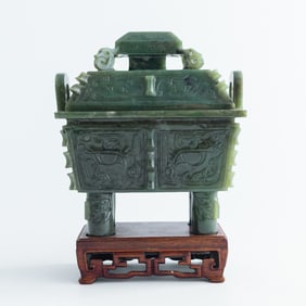 A Chinese spinach jade ding-form censer