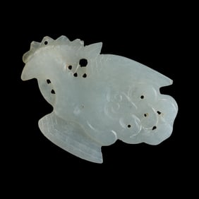 A Chinese white jade carved plaque, Ming dynasty or earlier
