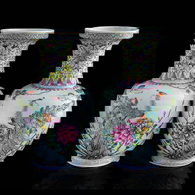 A pair of Chinese famille rose ‘flower and bird’ vases, Republic period: A pair of Chinese famille rose ‘flower and bird’ vases Republic period Each with six-character mark to underside. (2). H: 11 3/8, Dia: 6 3/4 in. (H: 28.89, Dia: 17.15 cm. (each)) Private collectio