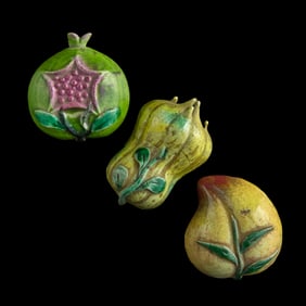 Three Chinese famille rose porcelain fruits, late 19th century