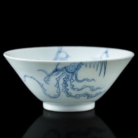 A Chinese blue and white 'phoenix' conical cup