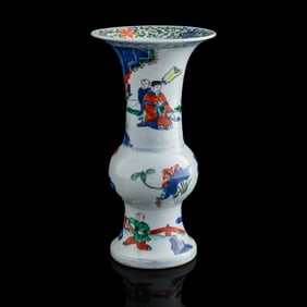 A Chinese blue and wucai 'figural' gu vase, 19th century