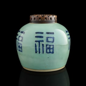 A Chinese celadon-ground blue enamel jar, late 18th century