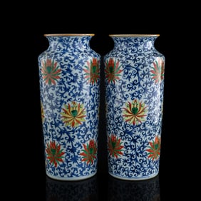 A pair of Chinese blue and enamel sleeve vases, late 19th century
