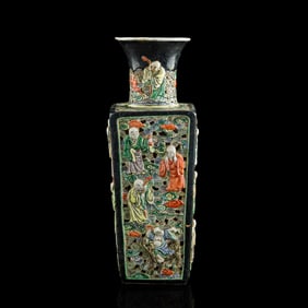 A Chinese black-ground sancai 'Eighteen Luohan' vase, 19th century