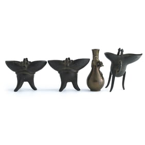 Three Chinese bronze jue cups and a vase, Ming/Qing dynasty