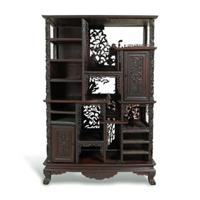 A Chinese carved hardwood 'floral' and 'hundred antiques' shelf, 19th century
