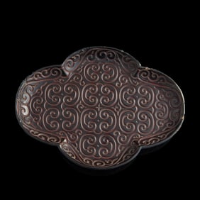 A Chinese tixi quatrefoil-form tray, 16th/17th century