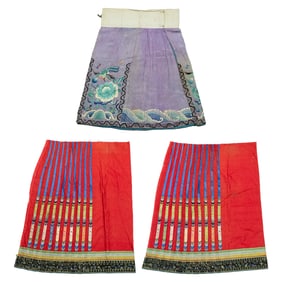 A Chinese complete skirt and two skirt panels, 19th century