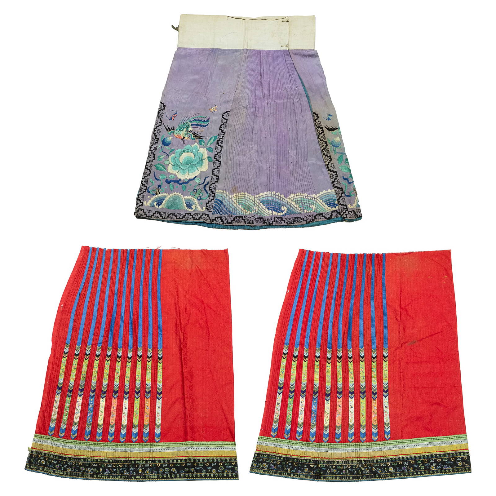A Chinese complete skirt and two skirt panels, 19th century