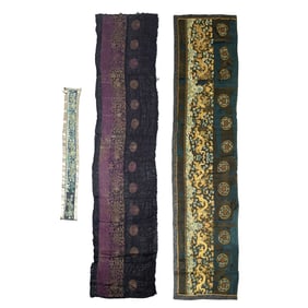 Three Chinese black-ground embroidered 'dragon' panels, 19th century