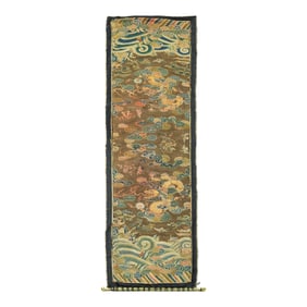 A Chinese apricot yellow-ground 'cloud and dragon' embroidery, 18th/19th century