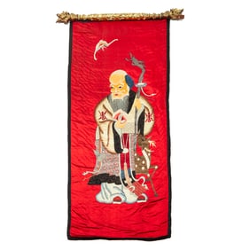 A Chinese red-ground embroidered 'Shou' panel, Republic period