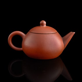 A Chinese Yixing zhuni teapot, late 19th century