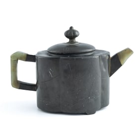 A Chinese pewter-clad Yixing zisha teapot inlaid with jade, 19th century