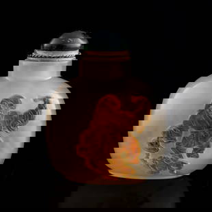 A Chinese agate snuff bottle, 19th century: A Chinese agate snuff bottle 19th century With 'Liu Hai' carving to body. H: 1 5/8, W: 1 5/8, D: 1 in. (H: 4.13, W: 4.13, D: 2.54 cm.) From Mrs. Wendt, Los Angeles, California. Family inheritance.