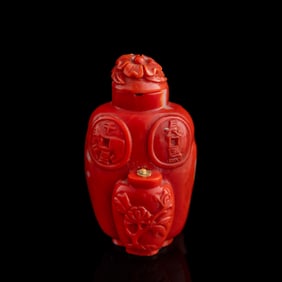 A Chinese carved coral 'coin' snuff bottle, 19th century