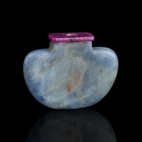 A Chinese archaistic blue stone (possibly kyanite) snuff bottle