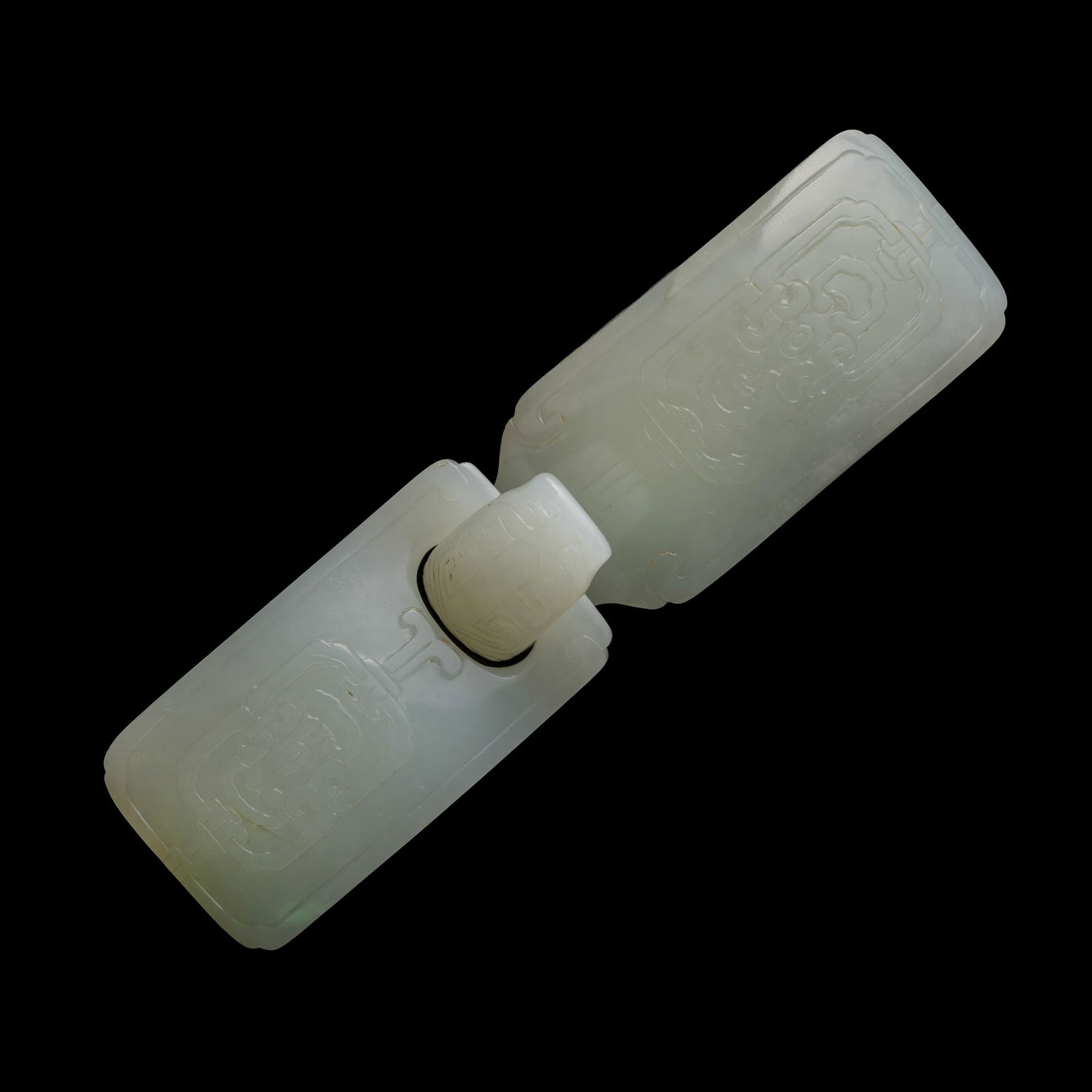 A Chinese white jade belt buckle, 18th century