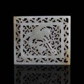 A Chinese reticulated white jade 'crane' belt plaque, Ming dynasty