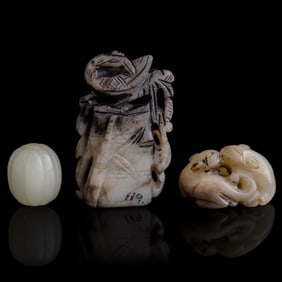 Three Chinese carved jade toggles, Ming dynasty