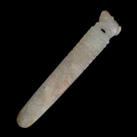 A Chinese carved jade plectrum, Ming dynasty