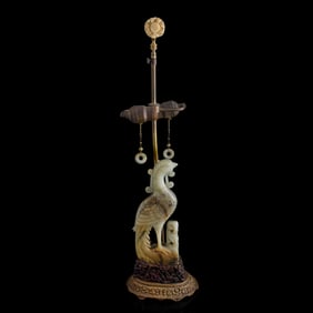 A Chinese jade phoenix-form converted lamp, 19th century