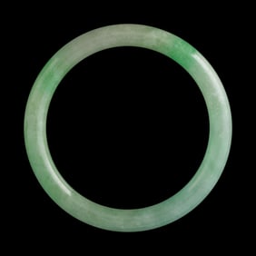 A Chinese jadeite bangle