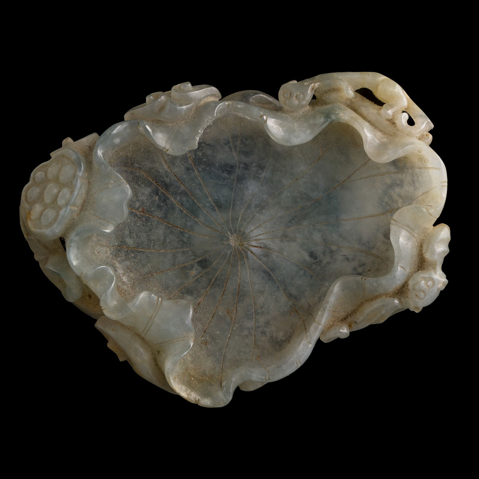 A Chinese jadeite lotus leaf-form washer, 19th century (1 of 9)