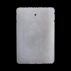 A Chinese white jade 'scholar and pine tree' plaque