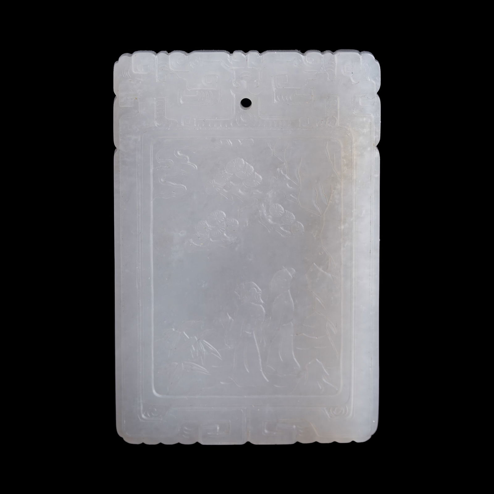 A Chinese white jade 'scholar and pine tree' plaque: A Chinese white jade 'scholar and pine tree' plaqueCarved with two scholars under a pine tree on one side, and an inscription signed with "Zigang" on the other side.H: 2 3/8, W: 1 5/8, D: 1/4 in. (H: