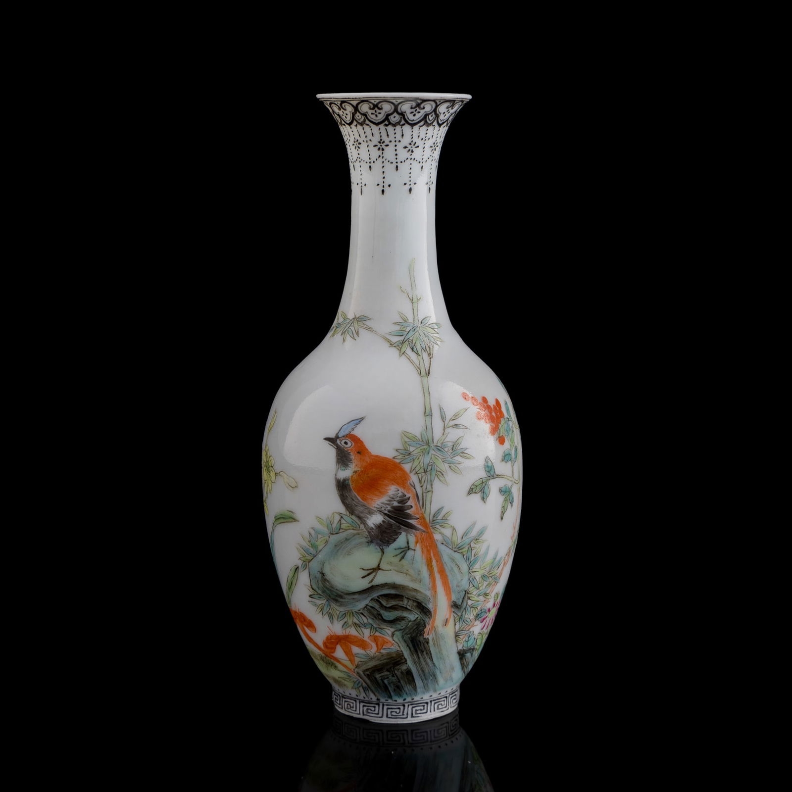 A small Chinese falangcai-style vase, Republic period: A small Chinese falangcai-style vaseRepublic periodDepicting a 'paradise flycatcher' bird amidst bamboo, flowers and rocks, also with a poem to the verso. With four-character mark to underside.H: 5